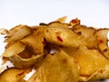 Indonesian snack cassava chips made from thinly sliced Ã¢â¬â¹Ã¢â¬â¹cassava and then fried and topped with chili